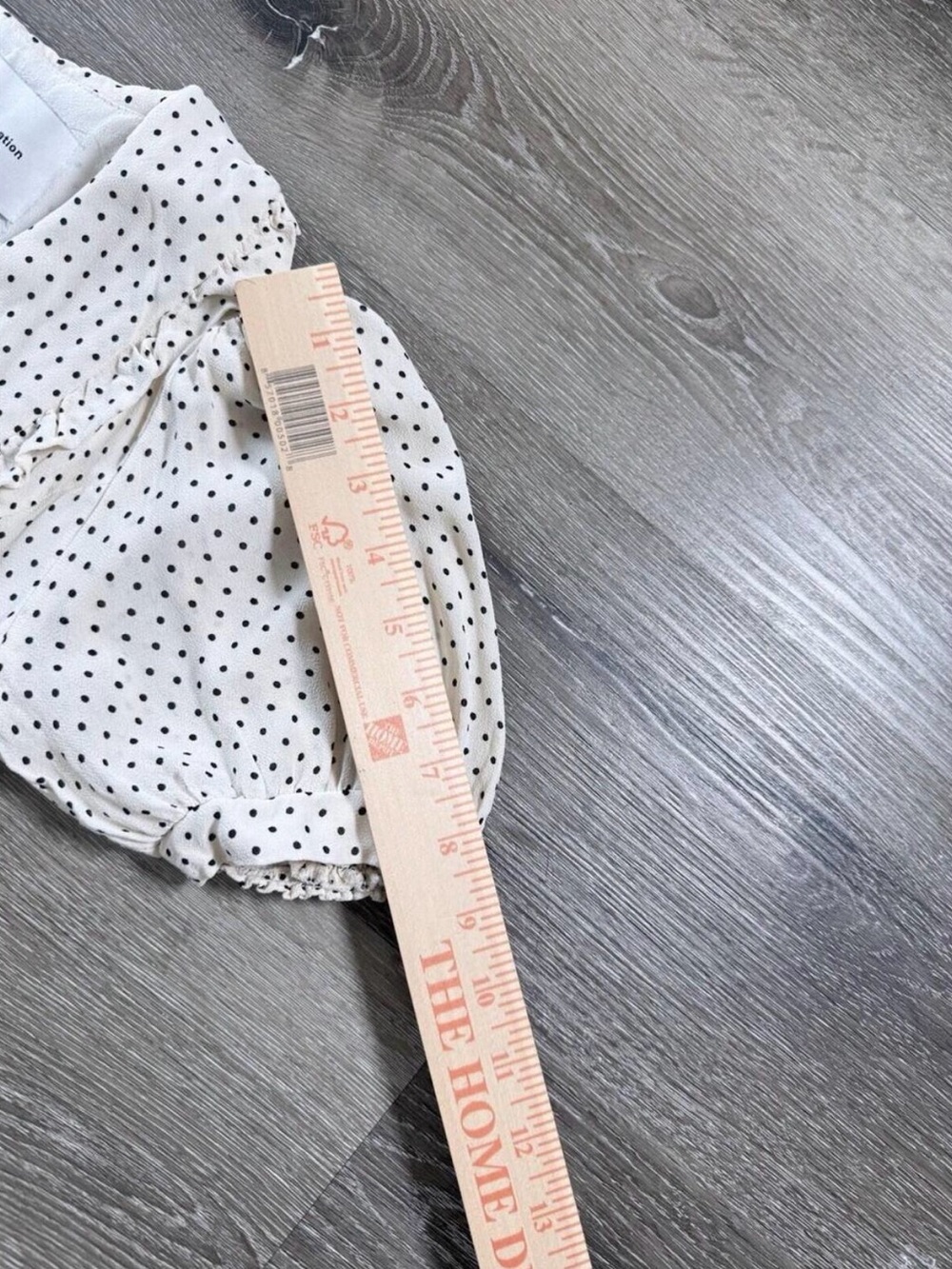 Reformation Kaylia Polka Dot Mini Dress in cream with a black bow - Picture 3 of 9